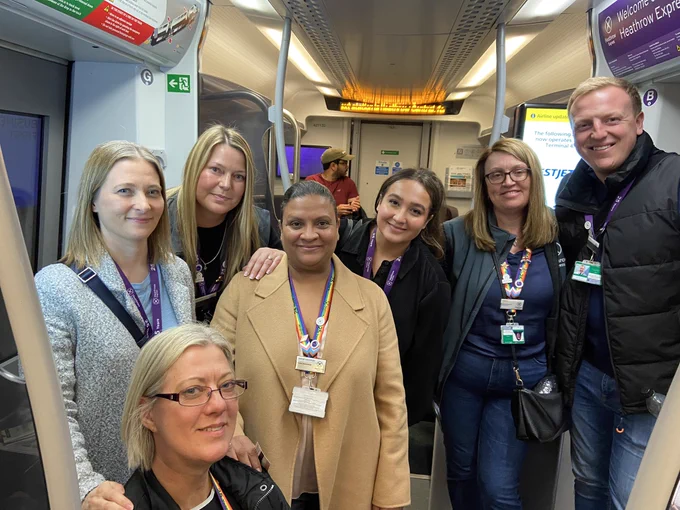 A team photo of the HEX colleagues involved in organising the day, taken on board a HEX train