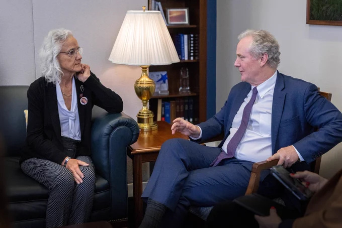 Photo of Senator Chris Van Hollen and Debra Tice.