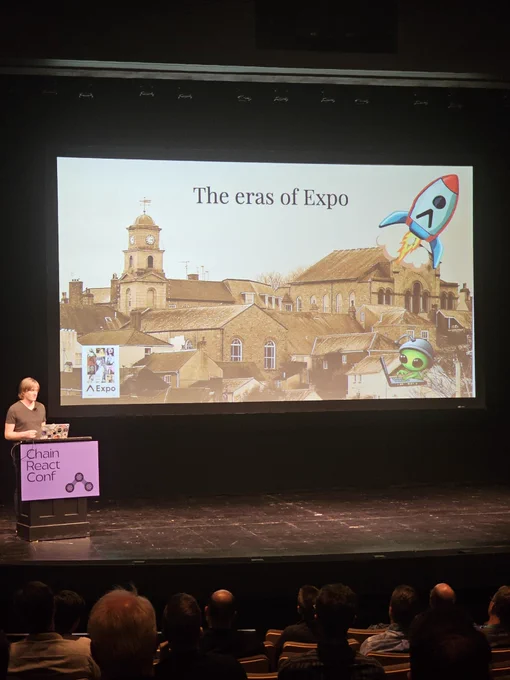 Keith presenting a slide representing the eras of Expo
