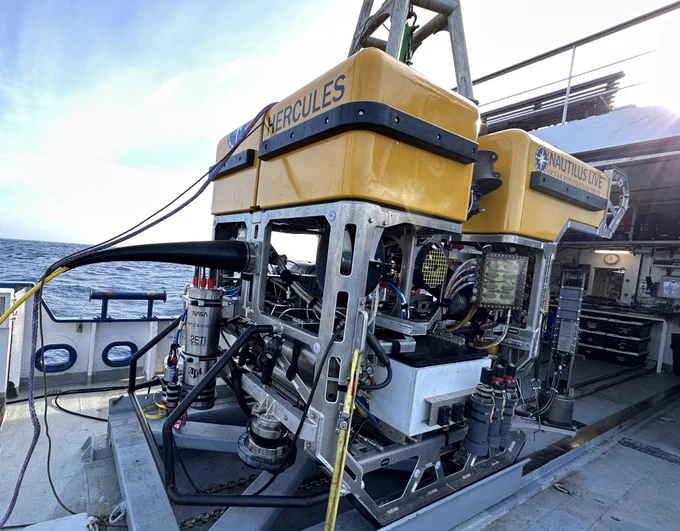 ROV Hercules on deck of Nautilus with a silver spectrometer mounted on the back