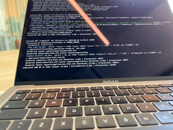 Laptop showing a terminal with Rails app logs