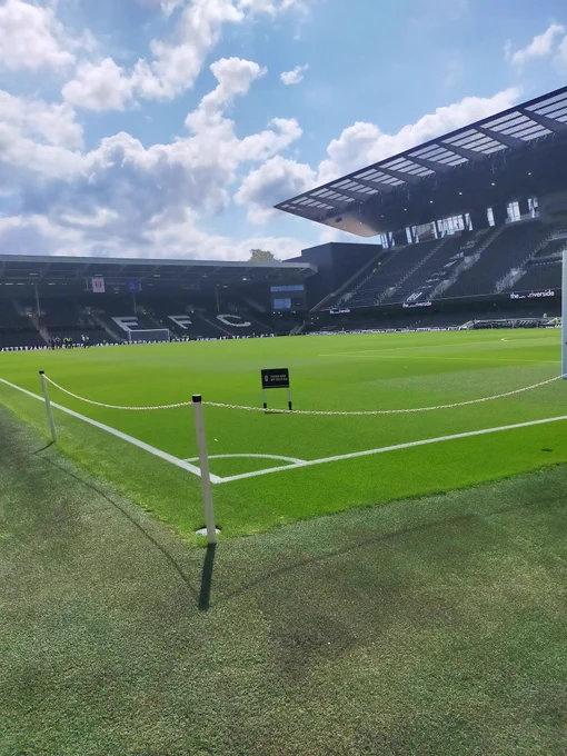 Pitch-level photo from the corner flag at the junction of the Johnny Haynes stand and Hammersmith End pre-match 