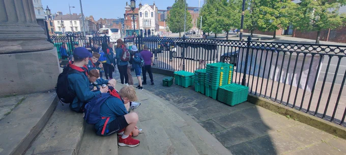 Scouts and a growing stack of ShelterBox boxes and lids