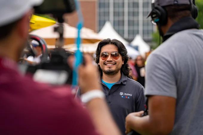 KAMU film crew filming “Heart of Art” host, Hector Niño.