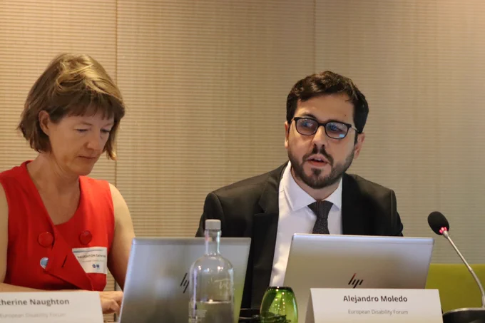 Alejandro Moledo (speaking) and Catherine Naughton