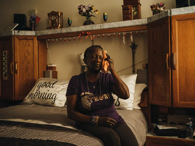 Karen Lewis at her home in Baltimore. US Cities Are Suffocating in the Heat. Now They Want Retribution. July 2021. Lewis is in the middle of a set of row houses and says it can get so hot sometimes she has trouble breathing.