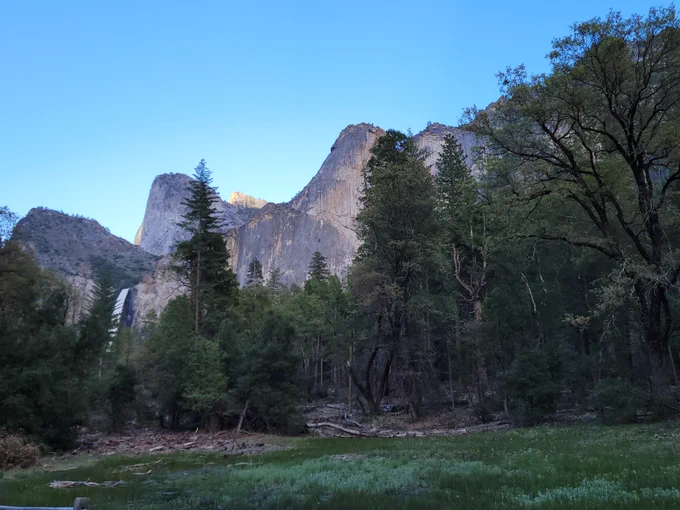 The lower valley scenery with mountains and waterfall of Yosemite. 