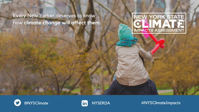 child on parent's shoulders in Central Park in autumn