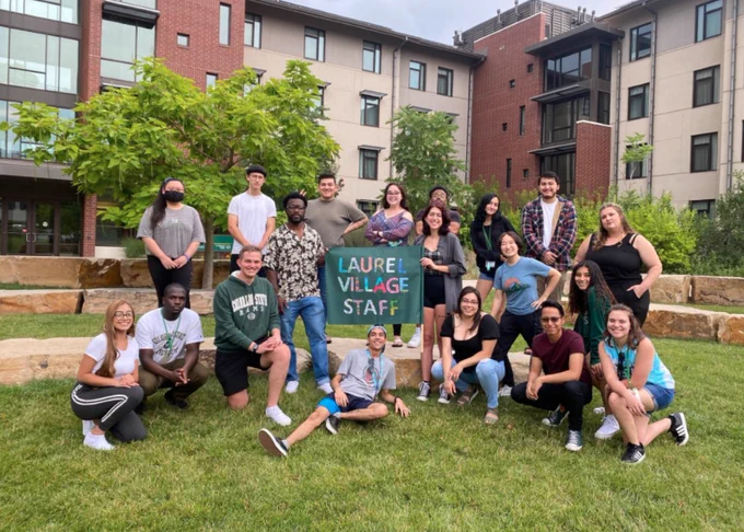 Litzy in a group photo of all of the staff of Laurel Village, where she worked.