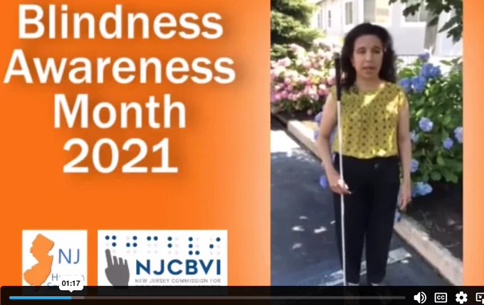 Sumara Garner, an olive toned, brunette female, stands outside among flowering bushes of purple and pink to discuss her experience with blindness and being a rehab specialist with NJCBVI logo and Blind awareness month text shown in image next to her video