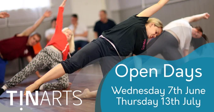 Four people in a dance studio taking part in training