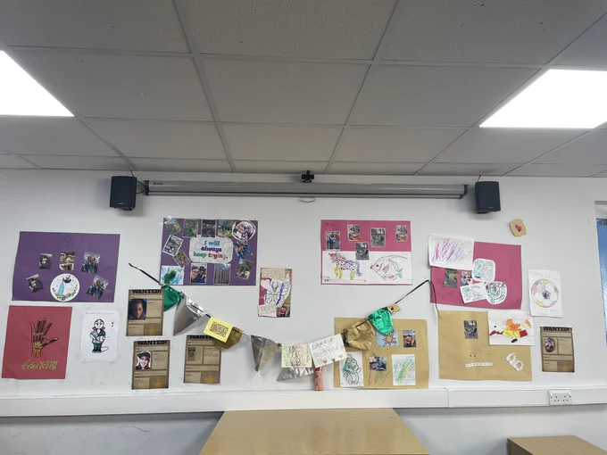 The back wall of the Devonport Park Activity Centre covered in artwork created by the young people of Routeways