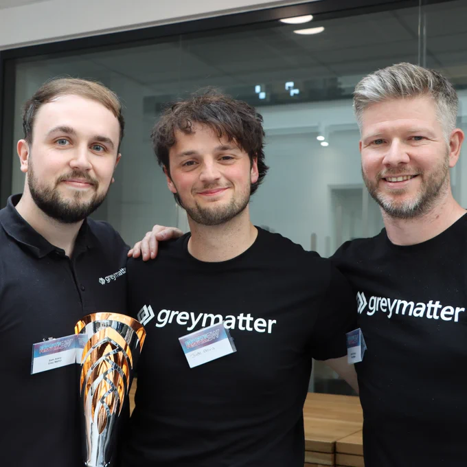 Team Grey Matter hold their runners-up trophy.  