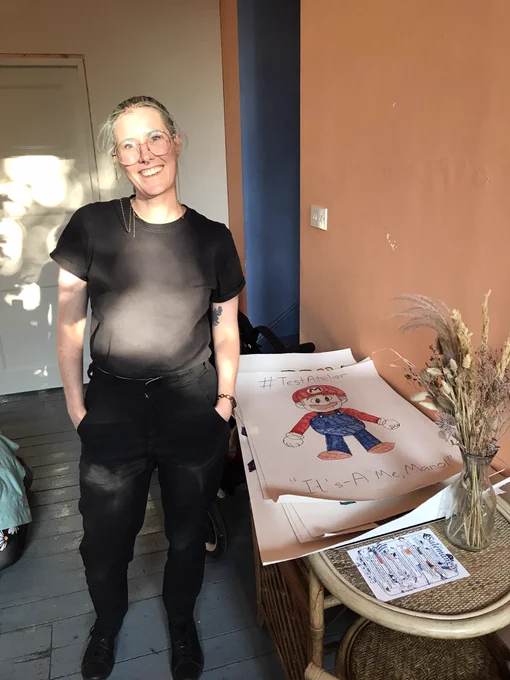 Gwen and a Super Mario poster