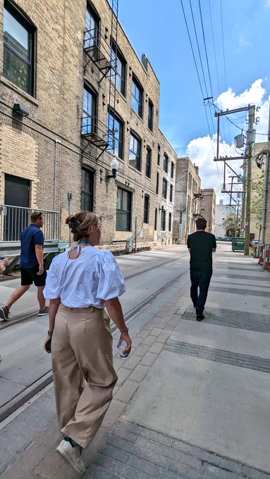 Hell's Alley, a revitalized historic laneway with former factories turned into residential and railway tracks and ties used as TWSI