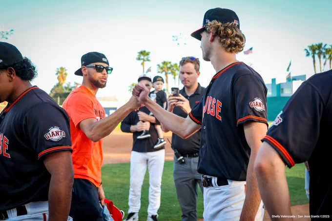 Stephen Curry says hello to San Jose Giants player
