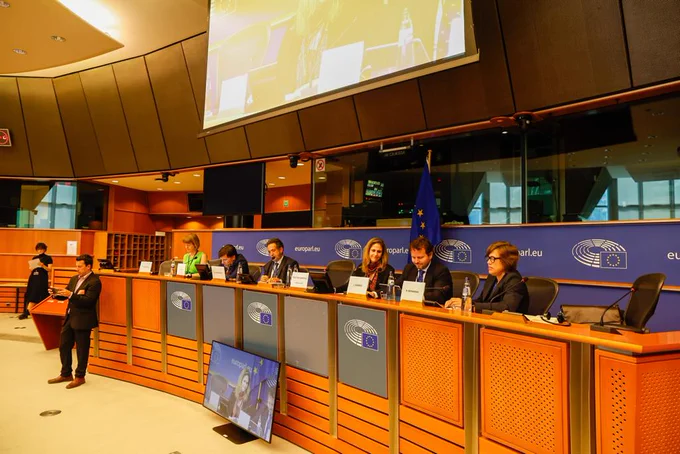 Photo of the speakers during the event