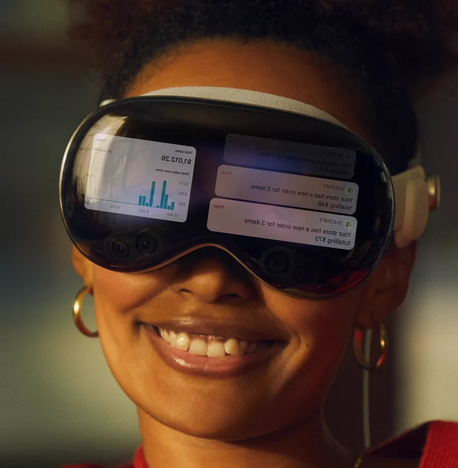 Image from Apple's announcement of the Vision Pro AR headset with Shopify sales dashboard and notifications onscreen