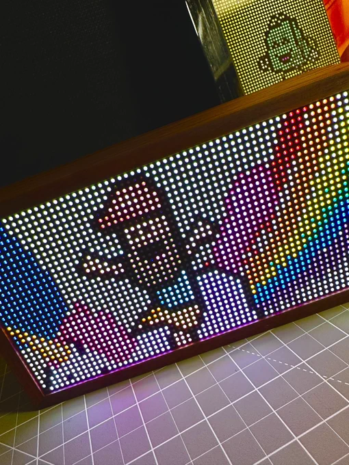 A TIDBYT displaying the world’s greatest human as pixel art