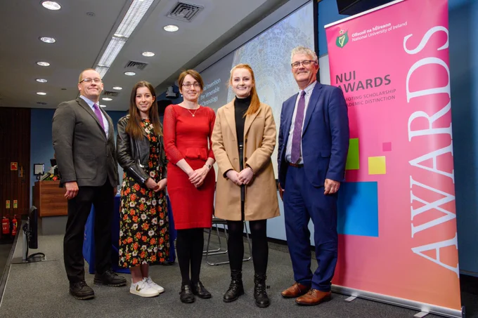 Dr Patrick O’Leary, Dr Niamh O'Mahoney, Dr Máirín MacCarron, Orla Keating and Prof John O'Halloran beside NUI  Awards banner.