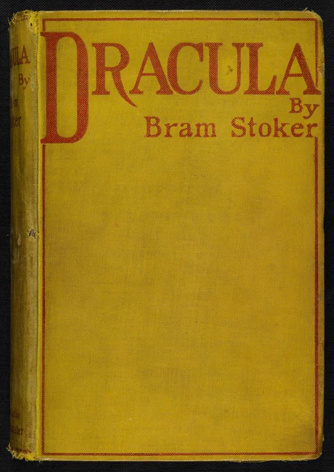 An image of the front cover of the first edition of Dracula. It is a bold yellow, with red lettering reading: Dracula by Bram Stoker.