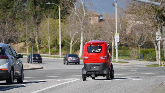 Tiny Electric Car on the Street
