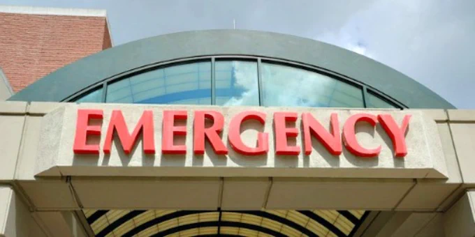 Sign reading "Emergency"