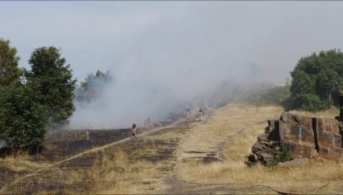 West Yorkshire Fire Service extinguishing a moorland fire after extreme hot weather.
