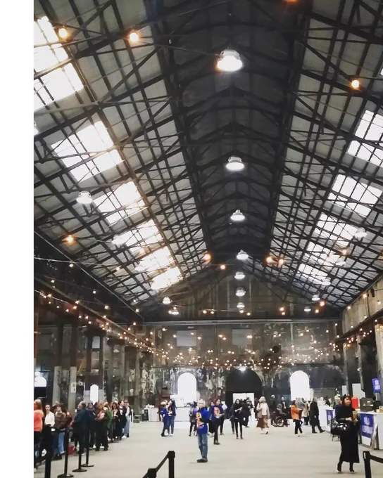 A photo of Carriageworks in Sydney, a large converted industrial space strung with fairy lights.