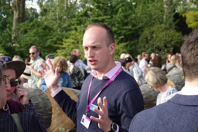 Simon Ward, Royal Entomological Society, talking to garden visitors.