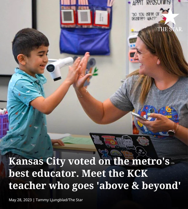 First grade teacher Mary Krejci high-fives with a student inside her classroom. White text reads: Kansas City voted on the metro's best educator. Meet the KCK teacher who goes 'above & beyond'
