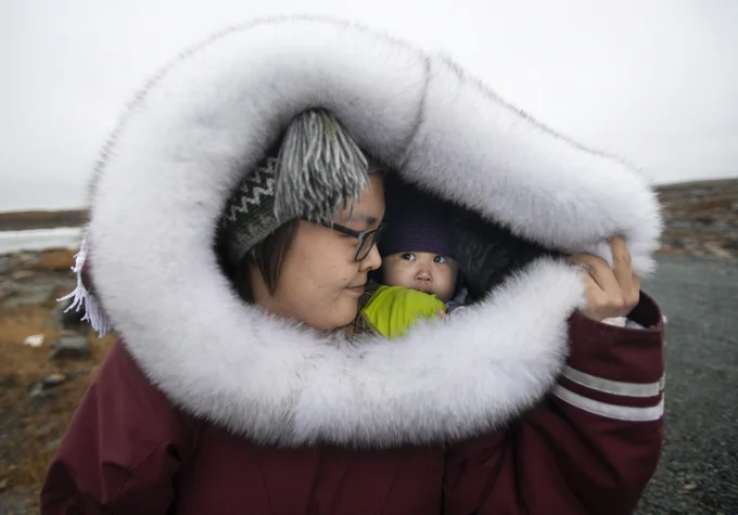 Maria Noolook and her daughter Adelynn from Rankin Inlet, Nunavut, are photographed in Iqaluit (the capital of Nunavut) is the only place in the territory where
Nunavut women are allowed to give birth outside of emergency circumstances, forcing many mothers to make the choice to travel south – to access birthing services. (Fred Lum/The Globe and Mail)