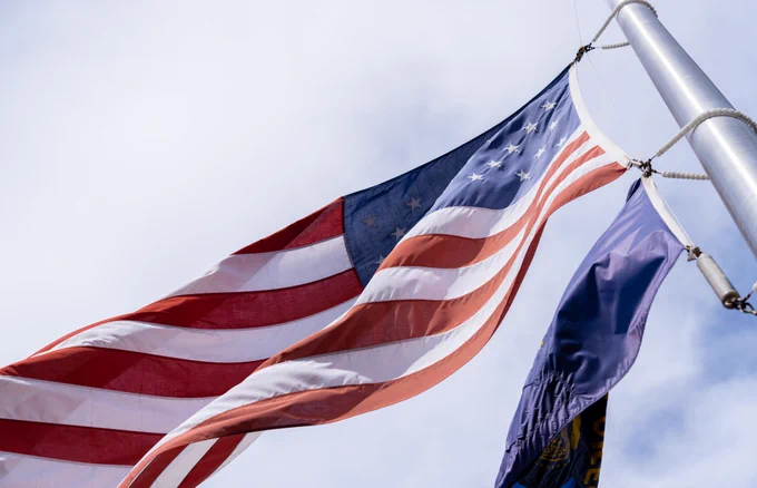 United States flag on a flag pole.