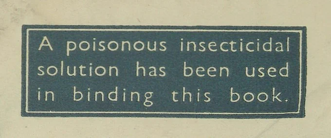 A note printed on paper stating "A poisonous insecticidal solution has been used in binding this book".