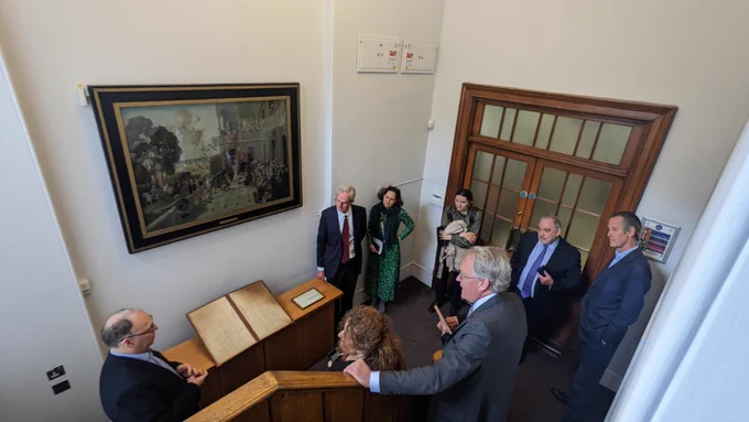Visit of delegation from The Fishmongers' Company looking at the University of London List of Proprietors 