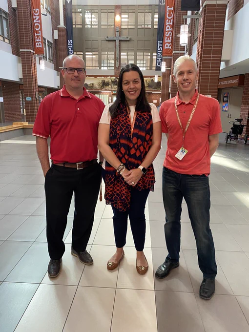Corpus Christi administration wearing red shirts for Red Shirt Day.