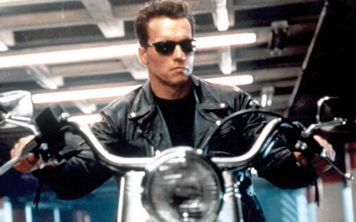 Arnold Schwarzenegger on a motorcycle in Terminator 2.