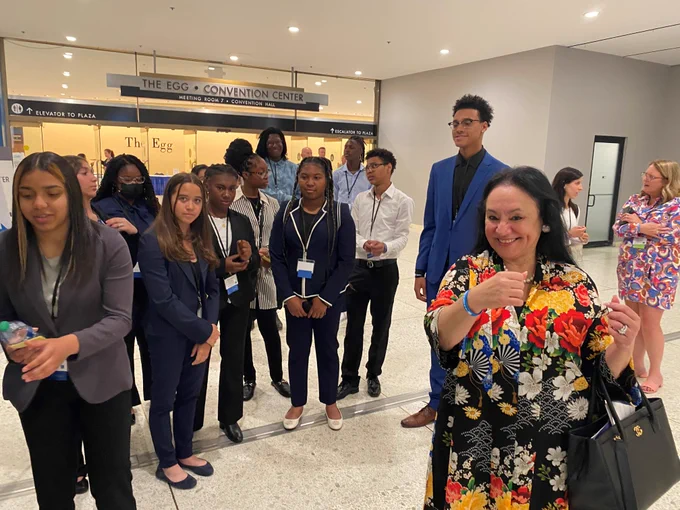 Students from Baldwin High School presented Commissioner Rosa with a new bracelet, which signifies that she is an official agent of social change.