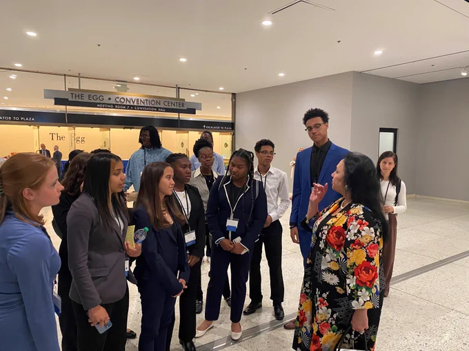 Students from Baldwin High School presented Commissioner Rosa with a new bracelet, which signifies that she is an official agent of social change.