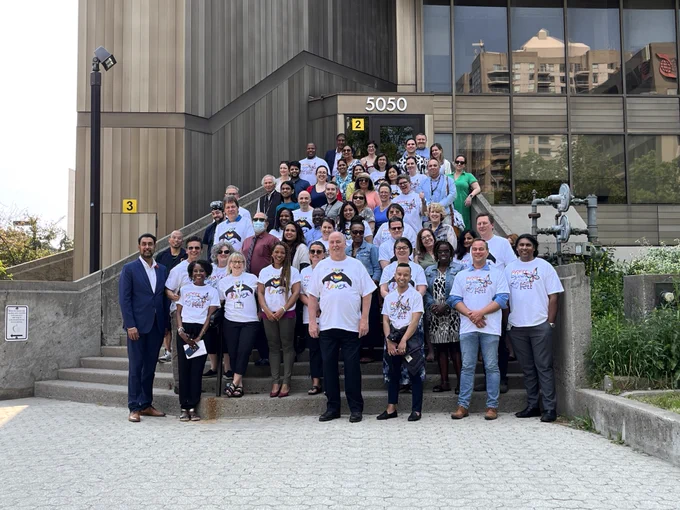 The attendees stood on the front steps of the TDSB Education Centre for a group photo.