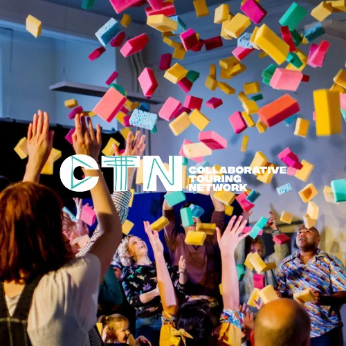 This image shows lots of sponges being thrown up in the air by people. The sponges are orange, yellow, pink, blue and green. In the middle of the image is the Collaborative Touring Network Logo. The letters CTN are in white with green in them, with the words collaborative touring network next to it. 