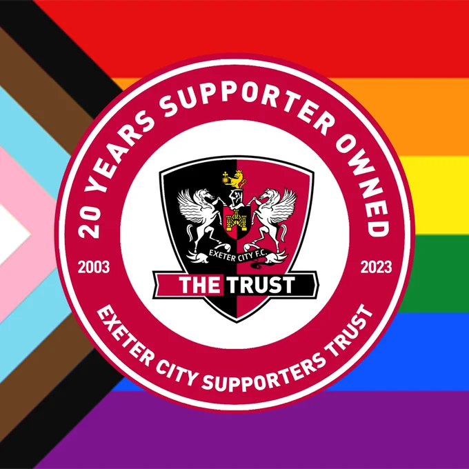 20th anniversary badge on top of LGBTQ  flag