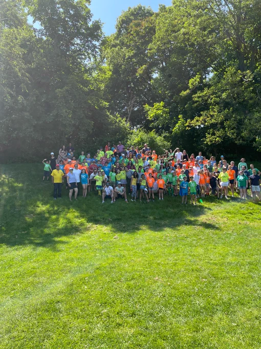 All Gr. 5 students with the parents who participated in the students vs. parents kickball game!