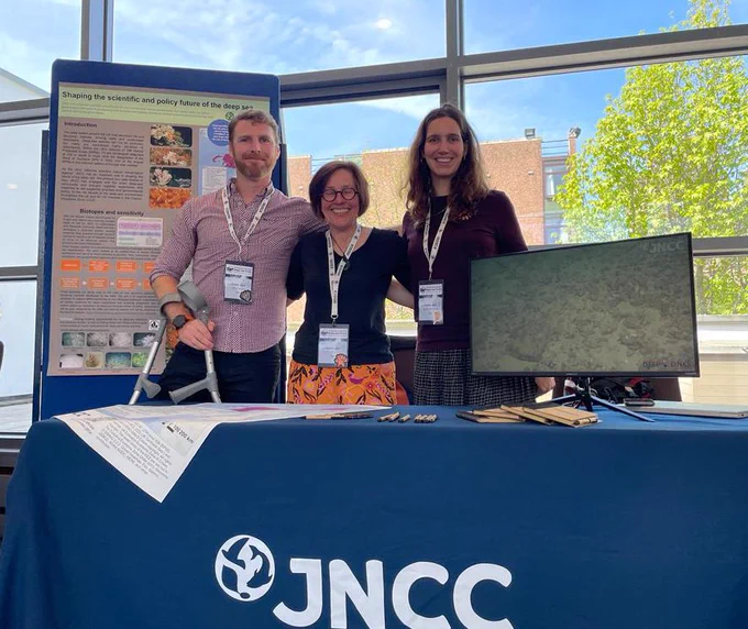 JNCC staff at the JNCC stall at the conference