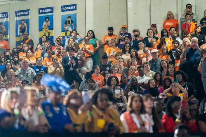 Students, teachers, and parents listen as Vice President Harris delivers remarks at John R. Lewis High School in Springfield, VA.