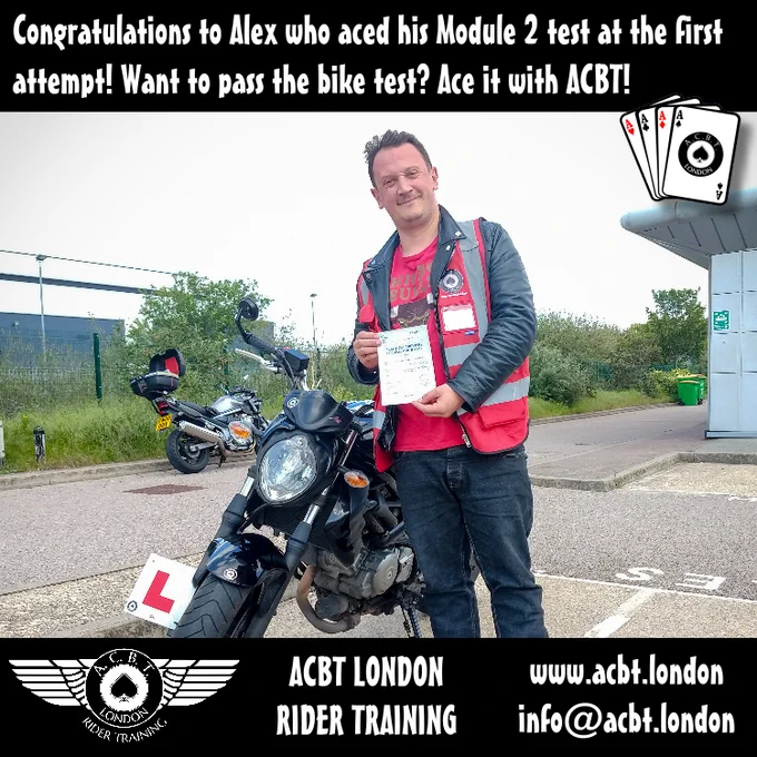 Happy motorcyclist with a Suzuki Gladius 650cc motorbike after passing the motorbike test