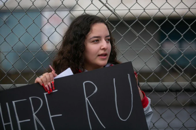 LOS ANGELES, CA - JANUARY 30: Genesis Cruz, 17, student at Jordan High School, protest in front of Atlas Iron and Metal Company that is located next door to her school on Monday, Jan. 30, 2023 in Los Angeles, CA. (Jason Armond / Los Angeles Times)