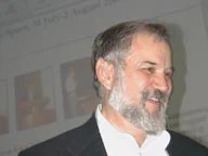 Photo of George smiling.  He was such a warm-hearted person and so much fun, as well as a great scholar.  We're lucky to have had his friendship and guidance over many years.  We'll treasure his inspiration.