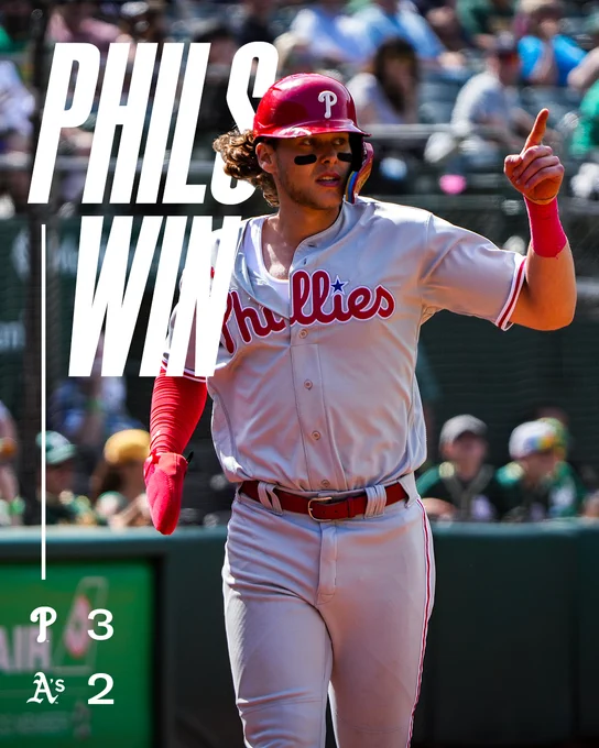 Phils Win 

Final Score: Phillies 3, Athletics 2 

Photo is of Alec Bohm running back to the dugout after scoring a run. He is wearing the road gray uniform and red helmet. 