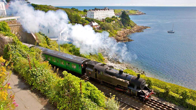 John Fahy photo of steam train at Dalkey illustrating Dalkey Castle's guided Joycean walk on Bloomsday 16th June 15.30pm https://dalkeycastle.com/home/events/bloomsday